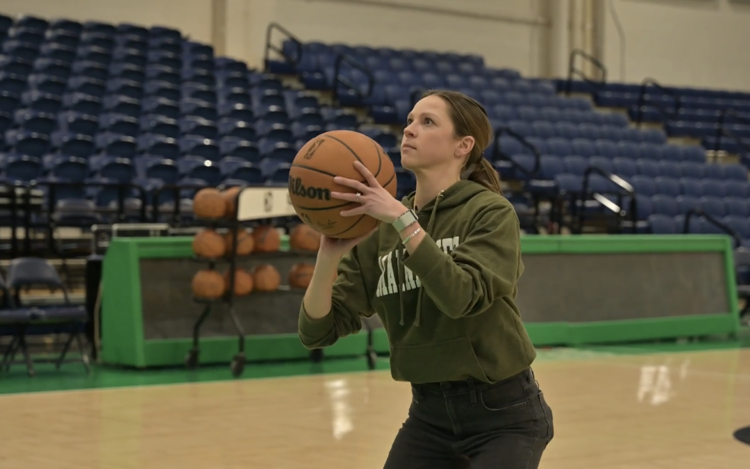 Sydney Hancock playing basket ball with the Maine Celtics